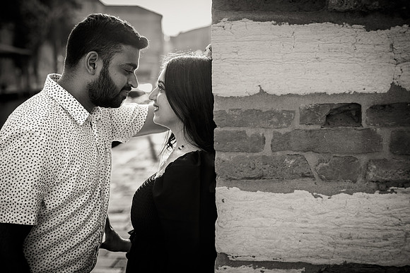 Full body shot of couple walking in Venice