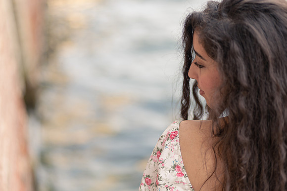 Woman gazing away in the sunlight Venice