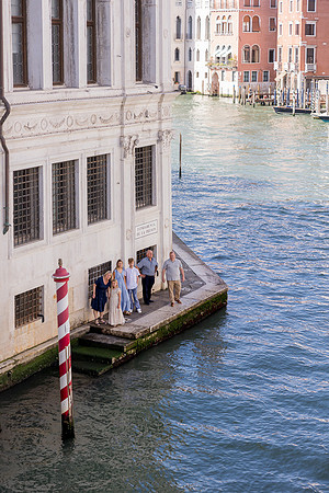 Father and son by Venice waterside