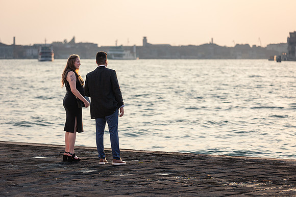 Couple by water on San Giorgio Maggiore island