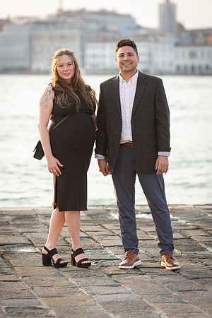 Couple posing at sunset by Venetian lagoon