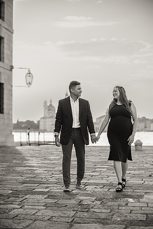 Shadows of couple on Venetian wall