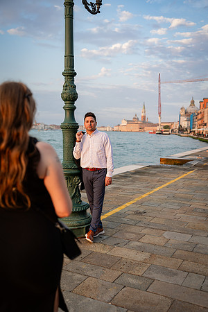 Candid moment by water on Giudecca island