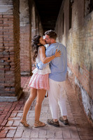 Couple kissing in a hidden alley in Venice.