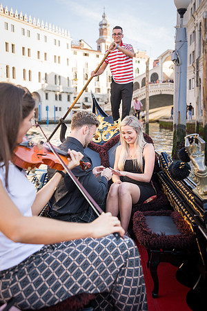 Couple arriving at Ca’ Sagredo Hotel in Venice