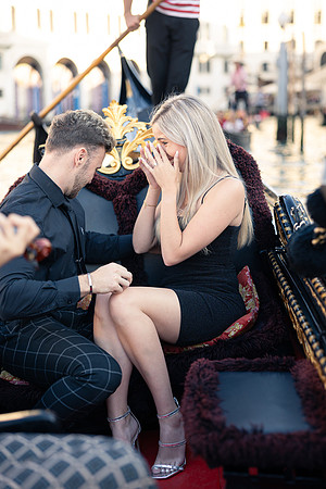 Couple dancing in grand hall of Ca’ Sagredo Hotel