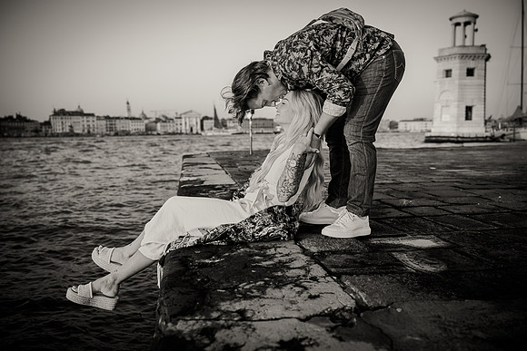 Black and white embrace after Venice proposal