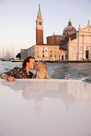 Embrace captured on water taxi in Venice after proposal