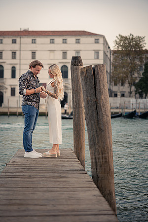 Intimate moment leaning against dock in Venice