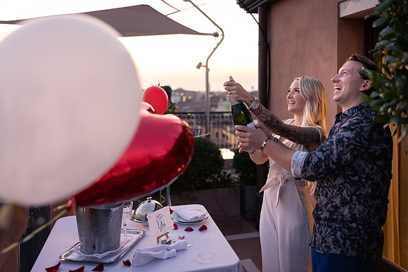 Toast celebration on rooftop terrace at St. Regis Venice