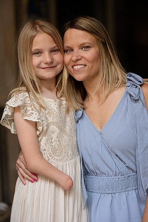 Mother and daughter smiling together