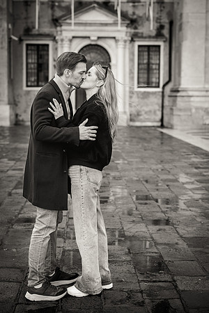 An artistic black-and-white shot of the couple, capturing a timeless engagement.