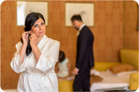 Bride looking reflective while preparing for her wedding in Venice.