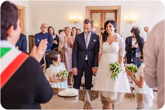 Signing marriage papers during a wedding in Venice.
