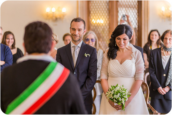 Bride and groom exchanging vows in Venice.