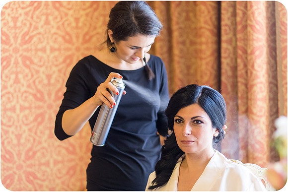 Bride having her hair styled before the wedding in Venice.