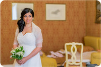 Bride holding a white flower bouquet, ready for her wedding in Venice.