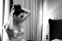 Bride adjusting hair black and white portrait