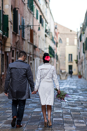 Couple walking historic Venice