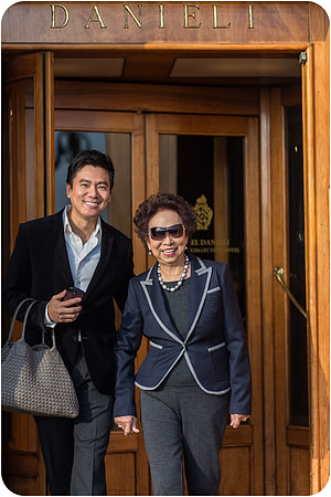 Mother and son entering Hotel Danieli, Venice during family photo session.