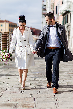 Bride groom walking to Greek Consulate