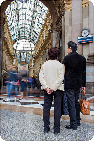 Mother and son enjoying photosession  in galleria Vittorio Emanuele, Milan