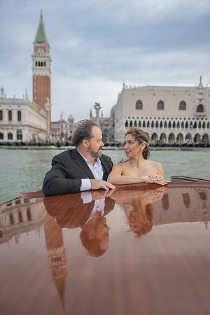 Groom on water taxi with Piazza San Marco in background - Anniversary sunrise photoshoot in Venice.