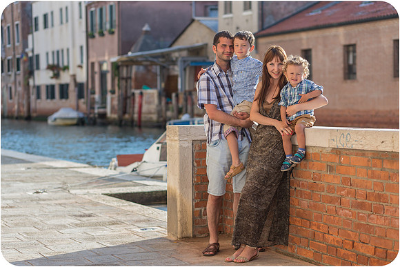 Family portrait by the canal in Venice