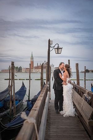 Close embrace with warm morning sunlight - Anniversary sunrise photoshoot in Venice.