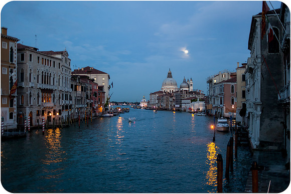 view of salute church at night from accademia bridge