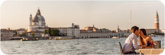 A candid moment of happiness after a surprise proposal in Venice.