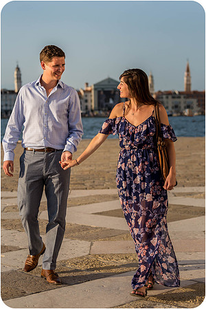 A romantic embrace following a heartfelt proposal on the Grand Canal.