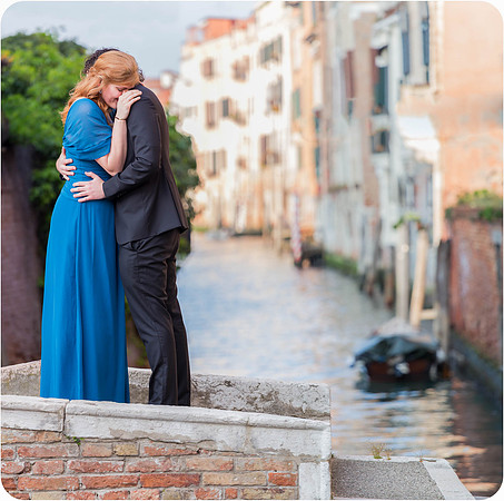 The couple hugs tightly, sealing the moment of their engagement.