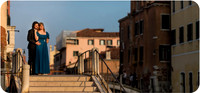 A warm and passionate kiss as the sun sets over Venice.