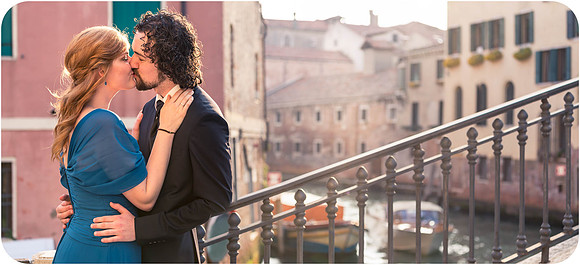 A soft and romantic close-up of the bride-to-be’s hand on her fiancé’s chest.