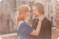 The couple gazes into each other's eyes, lost in the magic of Venice.