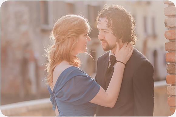 The couple gazes into each other's eyes, lost in the magic of Venice.