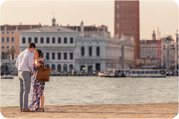 A stunning engagement captured with the soft glow of the Venetian skyline.