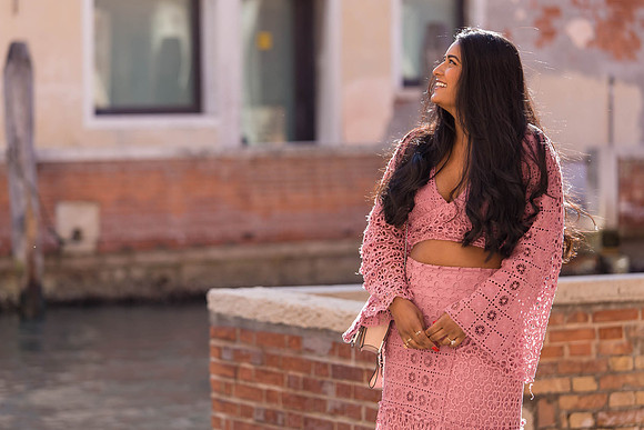 Bride-to-be smiling by the canal in Dorsoduro, Venice.