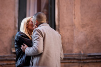 The couple shares their first kiss after getting engaged on a beautiful Venetian bridge.