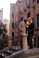 The couple walks hand in hand, soaking in their magical engagement in Venice.