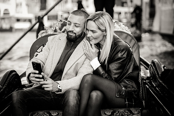A breathtaking engagement shot with the iconic Rialto Bridge in the distance.