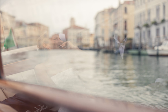 Blurred view of canal from inside the moving boat - Anniversary sunrise photoshoot in Venice.