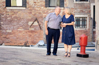 Family strolling through authentic Venice