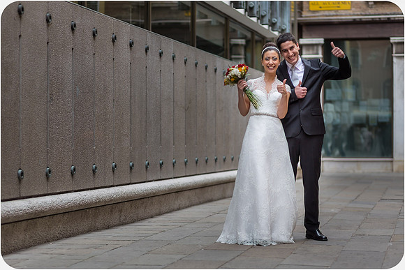 Couple posing at modern Venetian venue