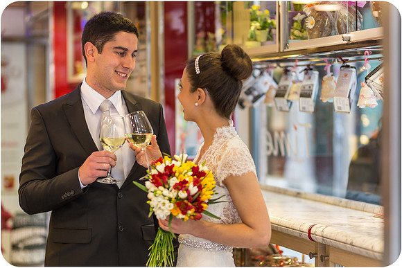 Bride and groom toasting with champagne