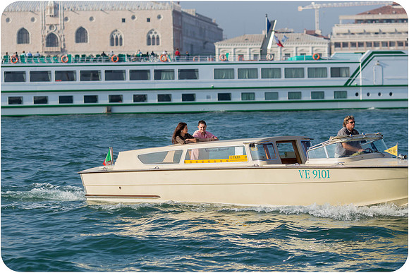 A beautiful surprise proposal in Venice, with the shimmering waters of San Giorgio in the background.