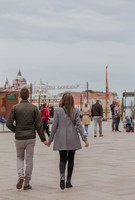 Couple walking in Venice before proposal