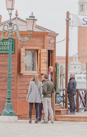 Man standing at Venice gondola station