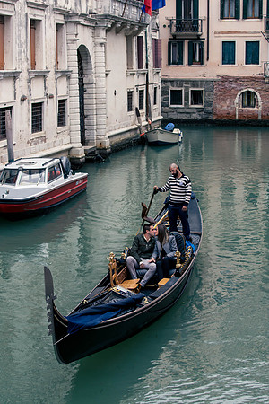 Couple embracing after proposal in Venice